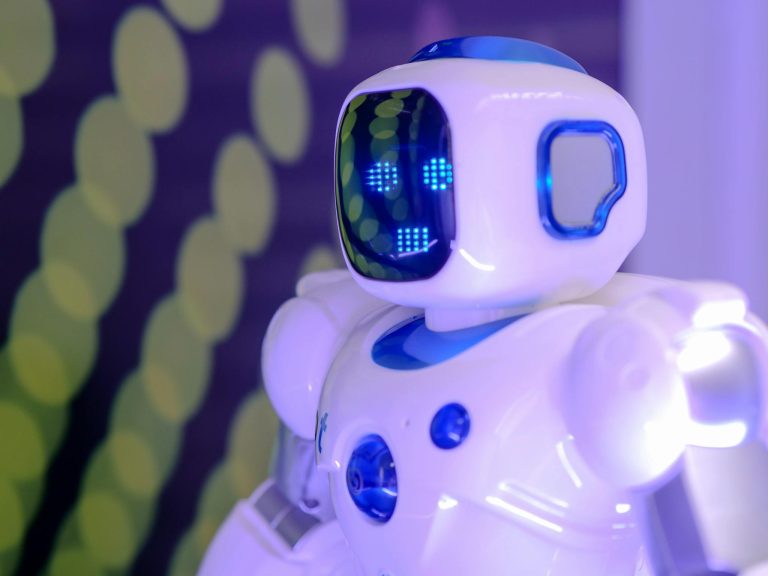 Modern toy robot with LED facial display, showcasing advanced technology and innovation.